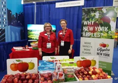 Cynthia Haskins (left) and Cailin Kowalewski (right) of the New York Apple Association. Behind them on the TV is a new commercial that they have made.